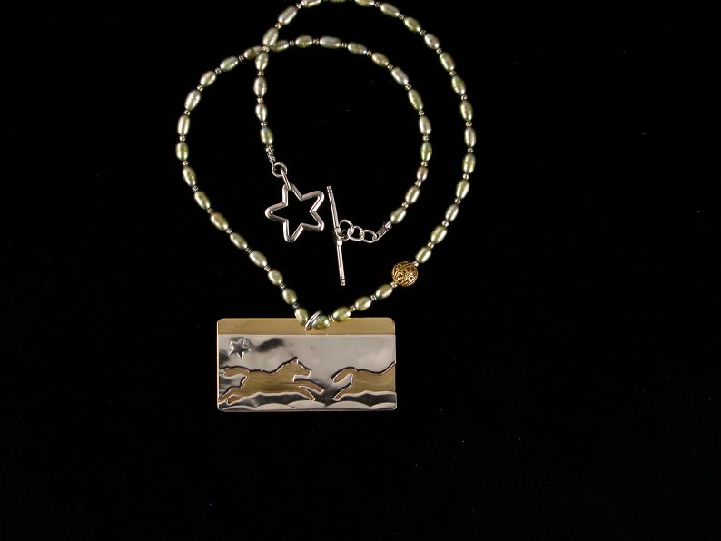 Two cut out sterling running horses on brass with silver star sky accent