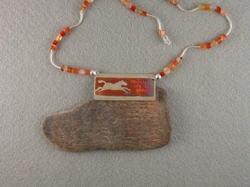 Copper (patinated by heat) cut out leaping horse on sterling pendant