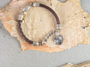 Braided leather bracelet with silver end caps