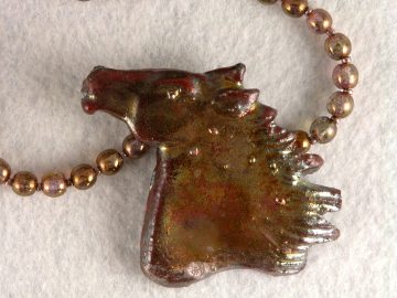 Raku pottery horse head on necklace of Czech glass beads