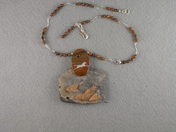 Sterling leaping horse on tiger's eye pendant