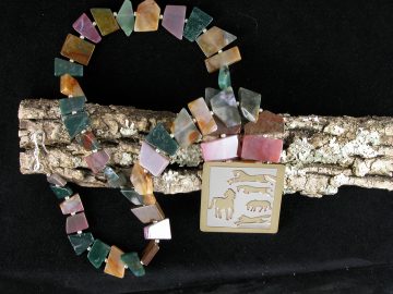 Five sterling cut out horses on brass on necklace of mixed jaspers