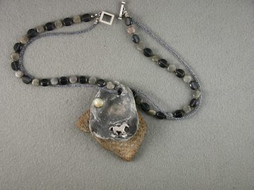 Galloping horse on sea shell