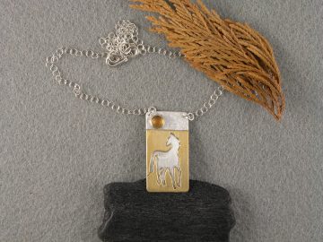 Brass cut out standing horse on sterling pendant with citrine cab sun