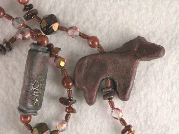 Lariat necklace with Raku pottery horse and Raku accent bead